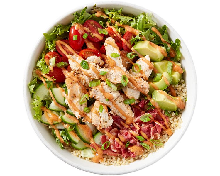 Buddha Satay Bowl at Freshii Sundance — rice noodles, peanut satay sauce, roasted broccoli, carrots and cabbage in SE Calgary